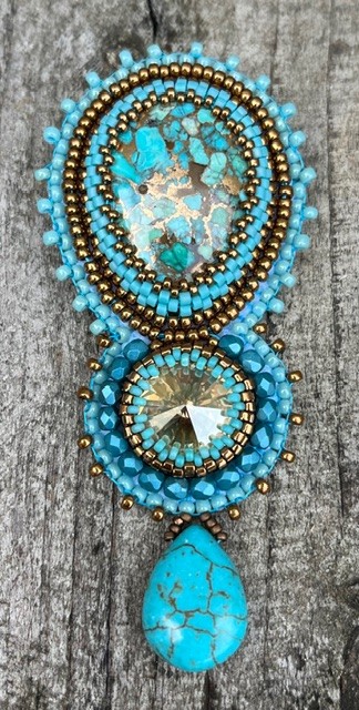 Broche Turquoise Queen
